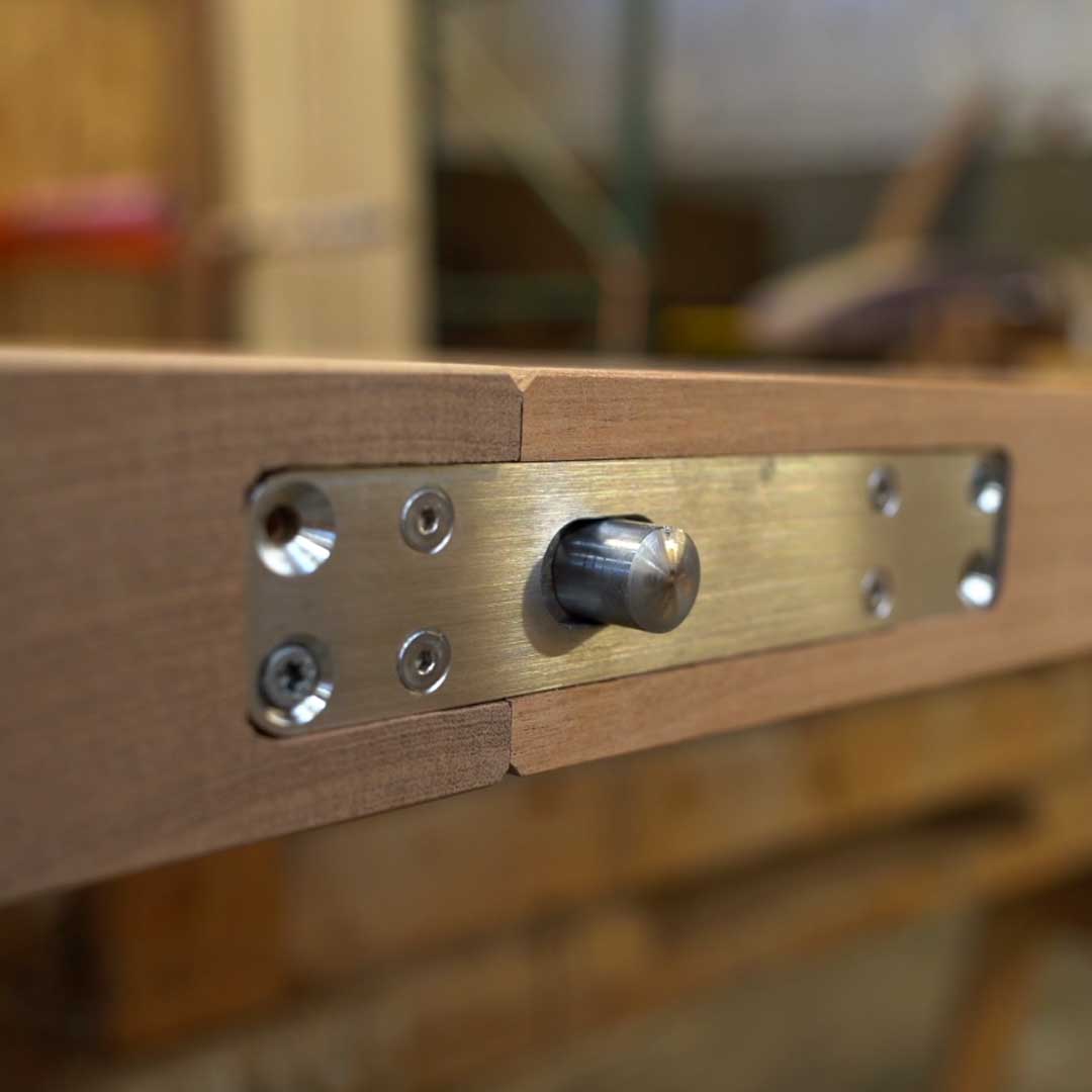 M+ Pivot Door hardware installed in a pivot door