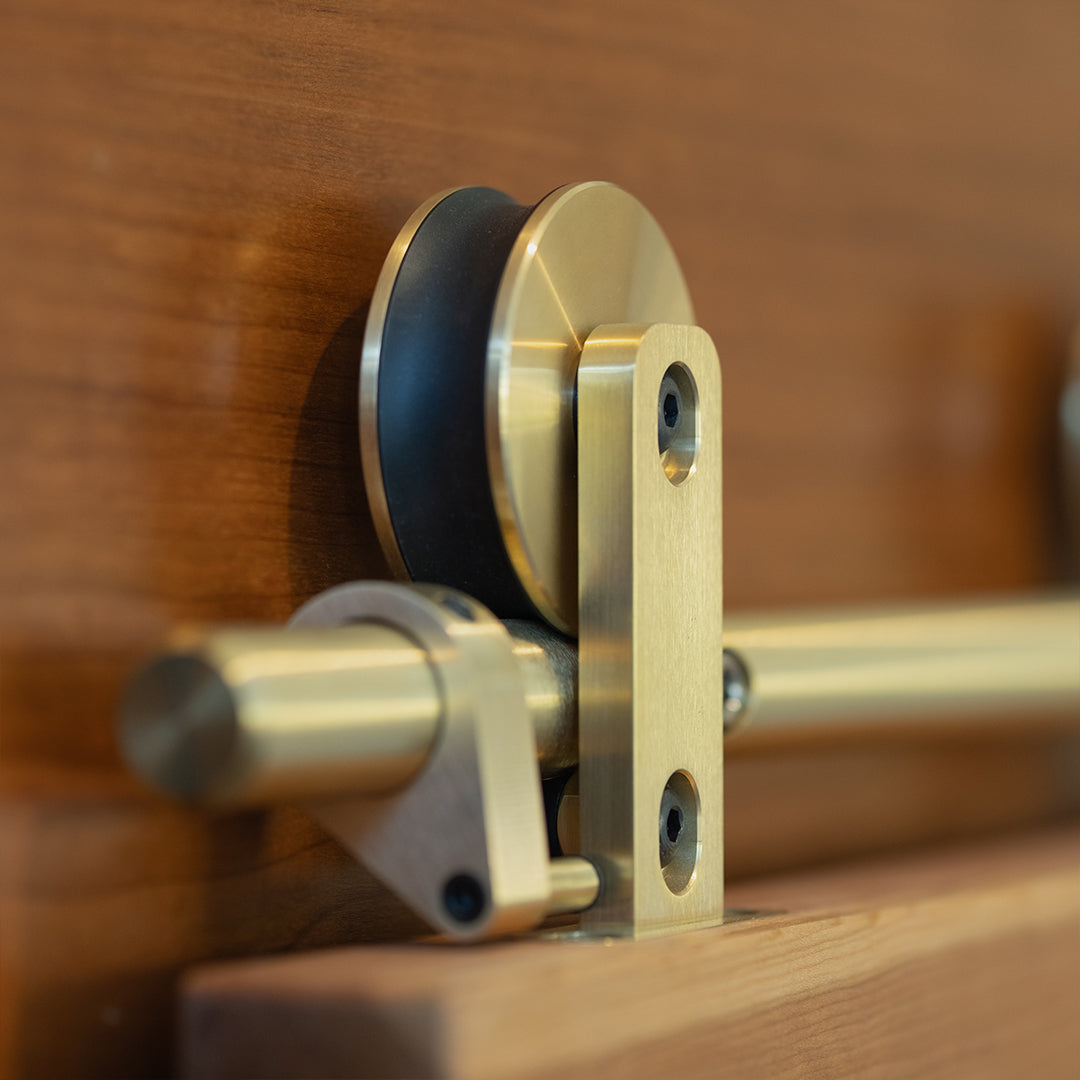 Brass Swiss Rod hanger closeup in context side angle view